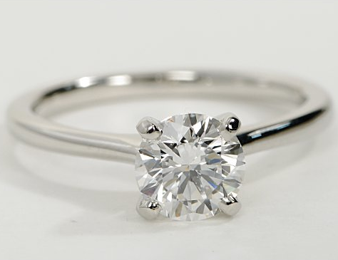 Thin Petite Solitaire Engagement Ring in Platinum